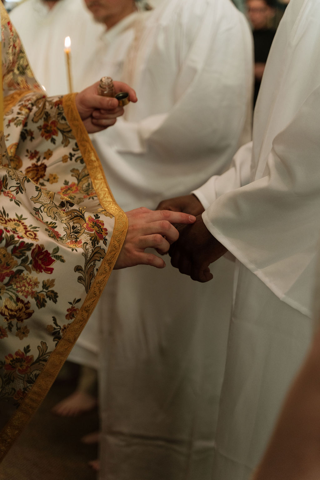 Clergy and servers at the front of the church